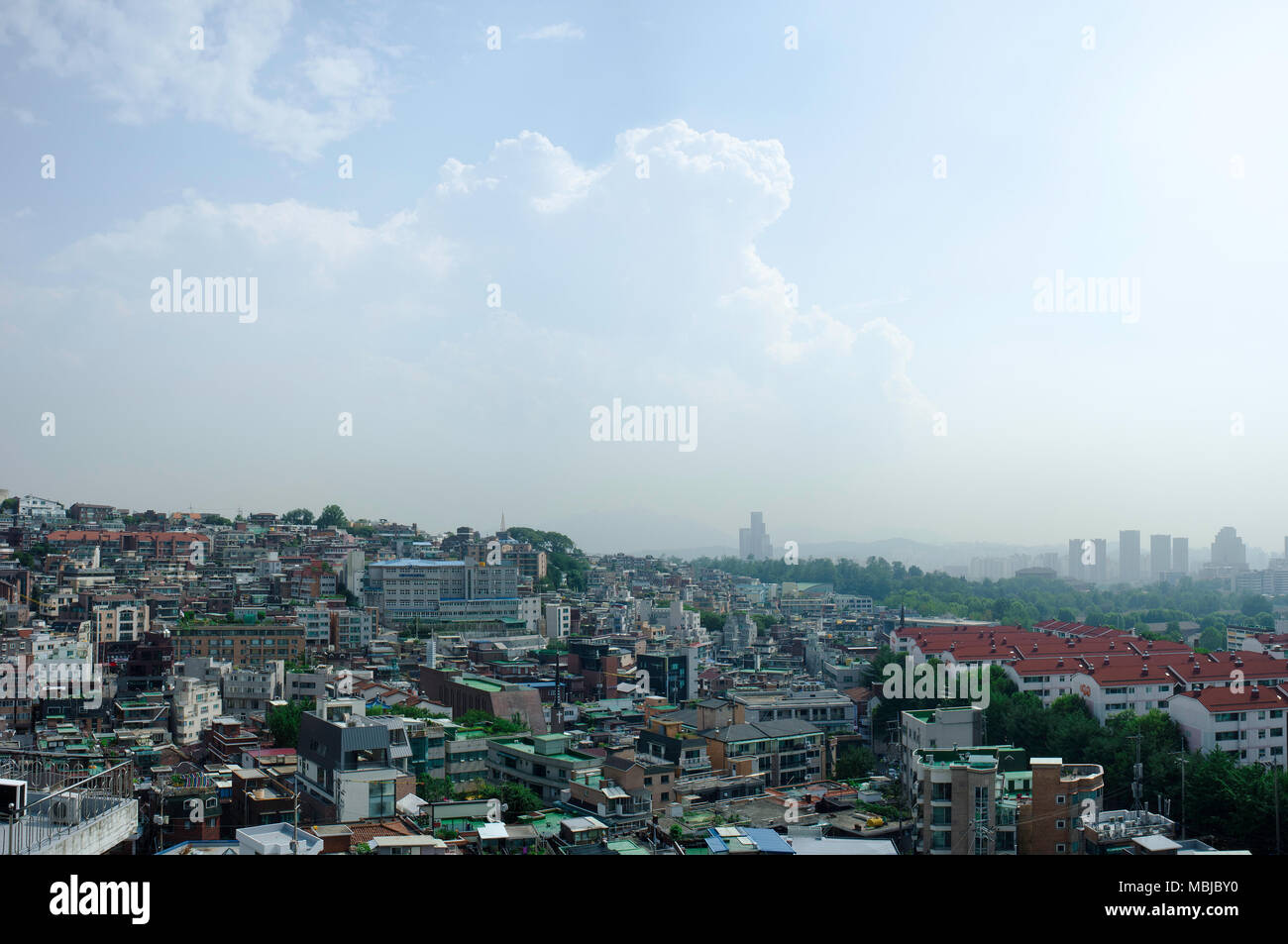 A view of the Yongsan district of Seoul, South Korea in the hot, rainy summer monsoon season. Stock Photo