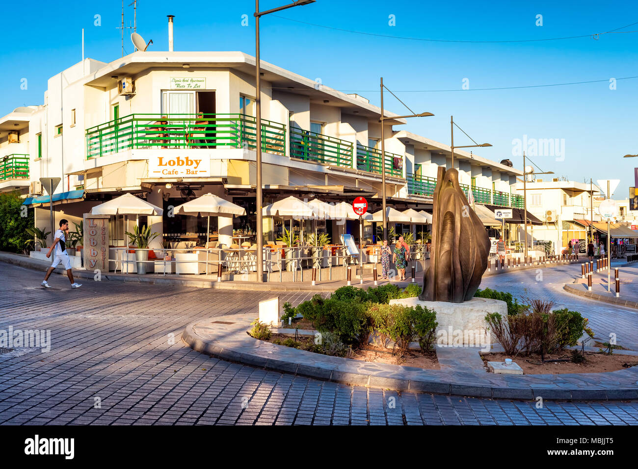 AYIA NAPA, CYPRUS - AUGUST 18, 2016: The Lady Farmer of Ayia Napa statue in the town centre. Stock Photo