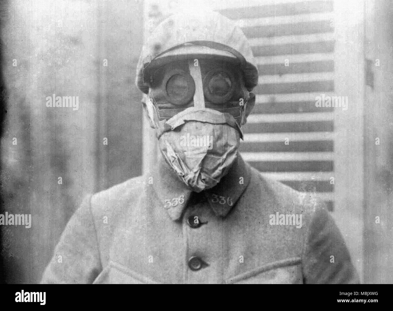 Handsome French Soldier Wears his Mask Stock Photo