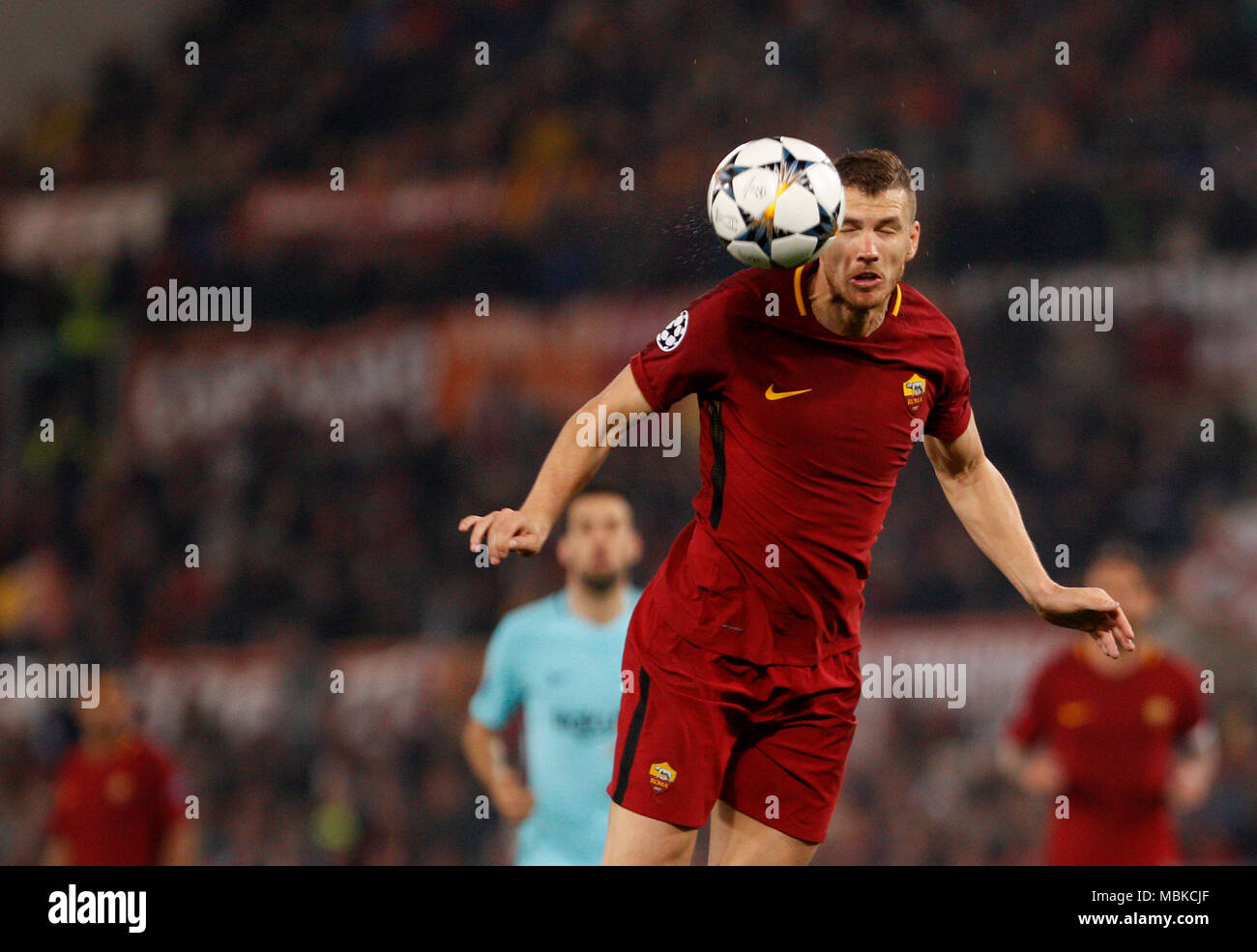 Rome, Italy. 10th Apr, 2018. Roma s Edin Dzeko heads the ball during ...