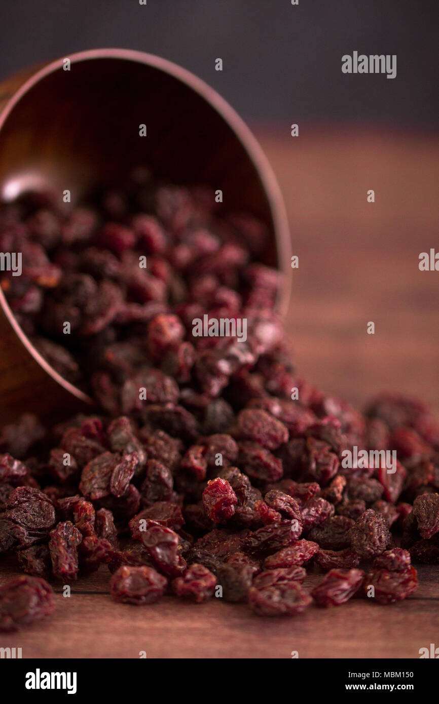 Dried Cranberries in a Wooden Bowl Stock Photo