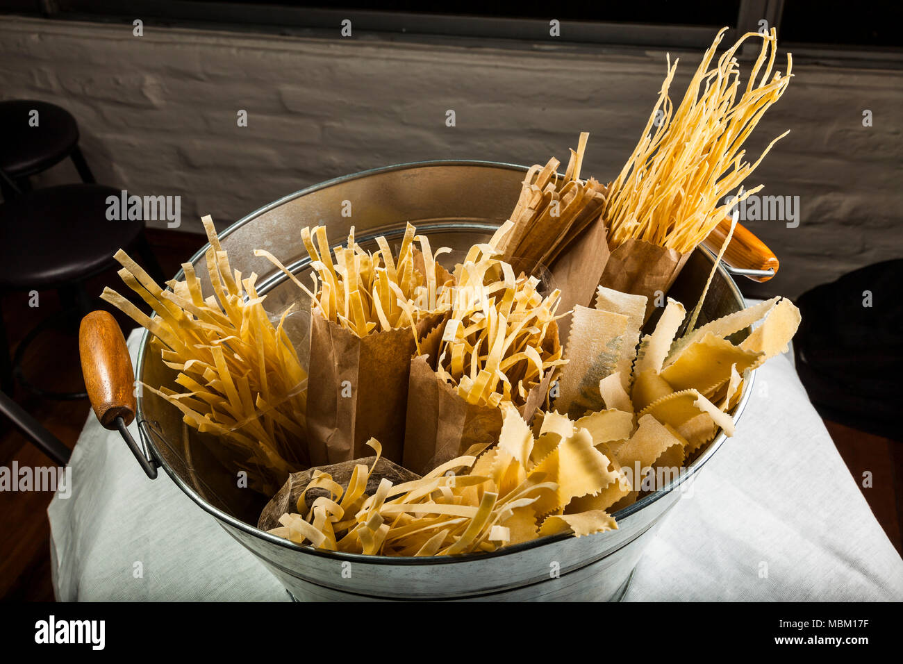 Various types of pasta on a metal tub Stock Photo Alamy