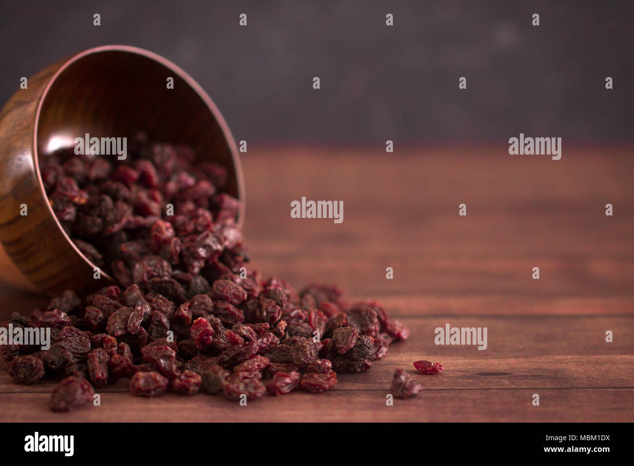 Dried Cranberries in a Wooden Bowl Stock Photo
