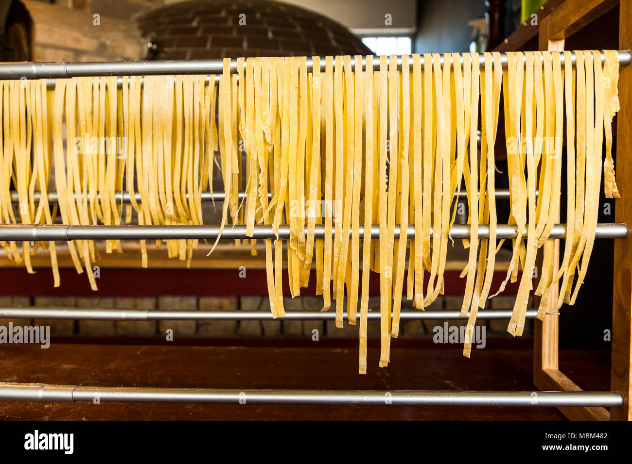 Homemade noodles drying on aluminum support Stock Photo Alamy