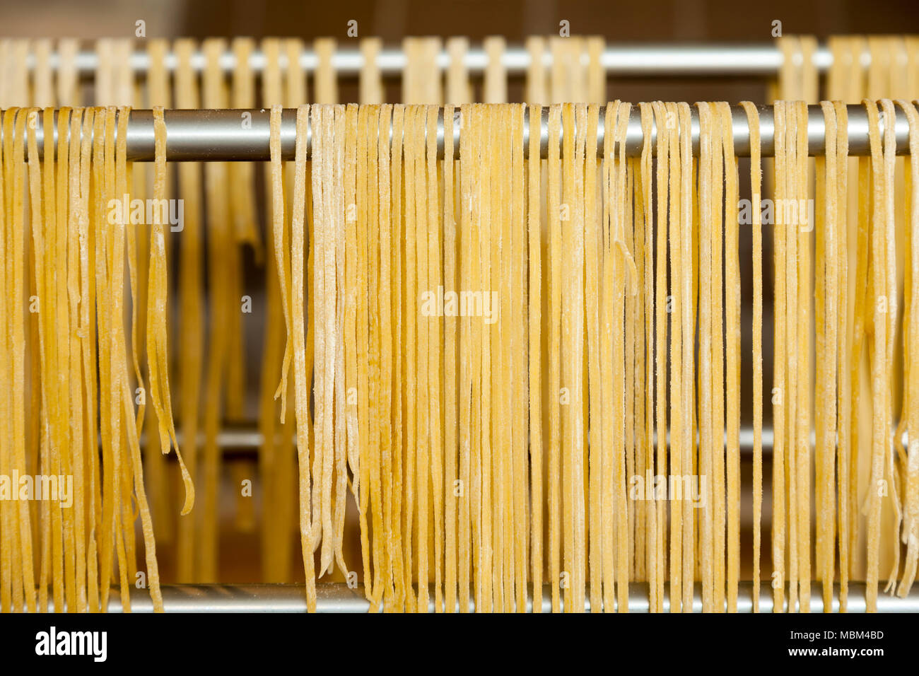 Homemade noodles drying on aluminum support Stock Photo Alamy