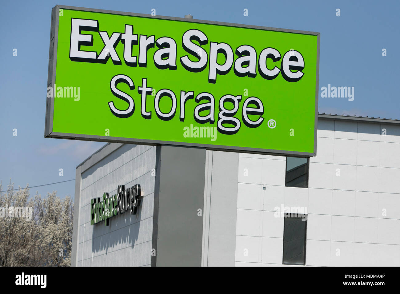 A logo sign outside of a Extra Space Storage location in Wheaton ...