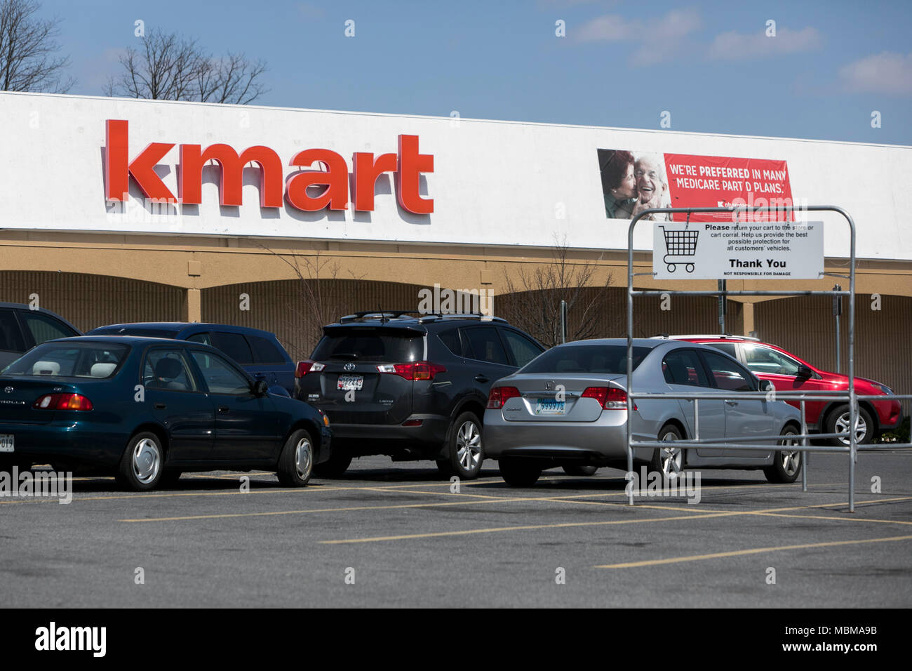 A logo sign outside of a Kmart retail store location in Silver Spring, Maryland on April 10