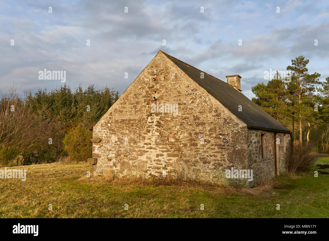 An Old Stone Cottage lies empty within Crombie Nature Reserve on a fine Winters day, near Dundee