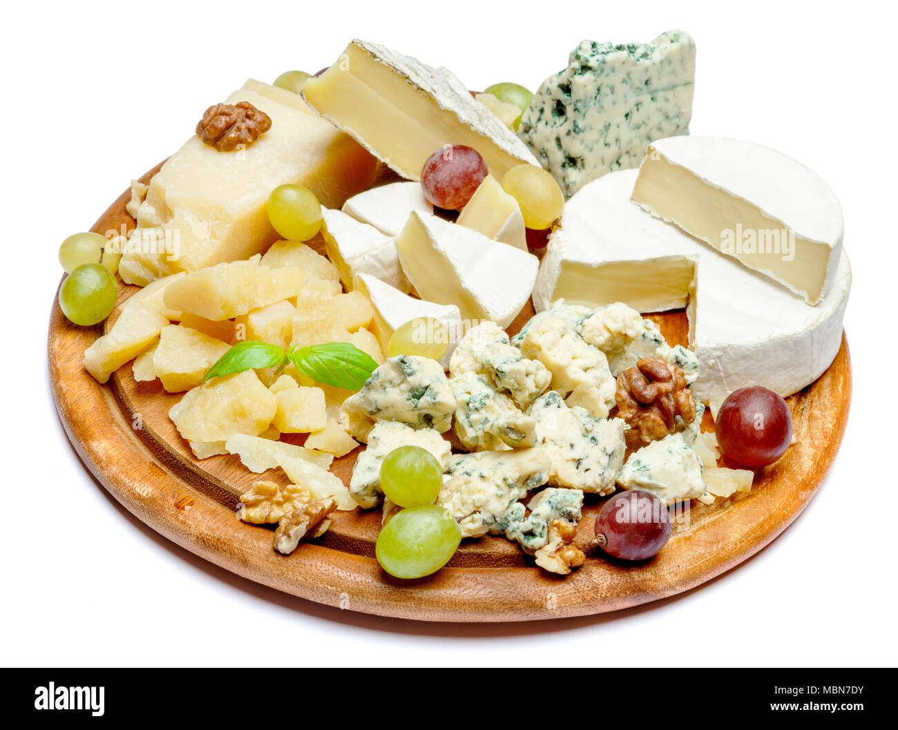Cheese plate with Assorted cheeses Camembert, Brie, Parmesan blue cheese, goat Stock Photo