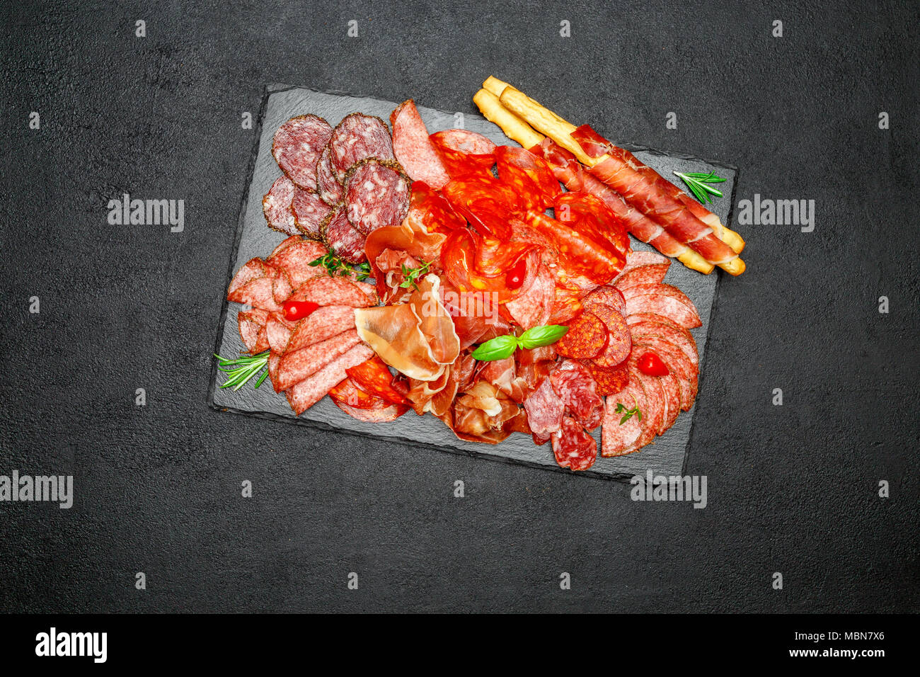 Cold meat plate with salami and chorizo sausage and parma Stock Photo Alamy