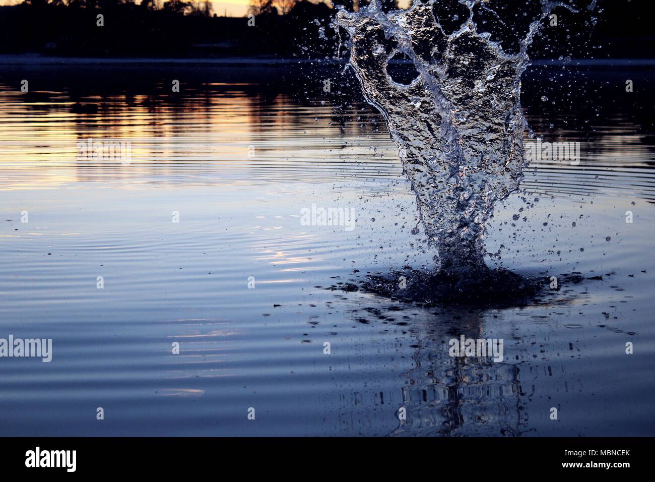 Water splashing at dawn, Hamar, Norway Stock Photo