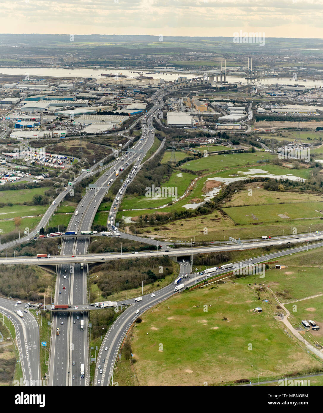 Junction 30 M25. A13 and M25 Junction, from the air, Essex, SE England UK, Dartford Crossing distant Stock Photo