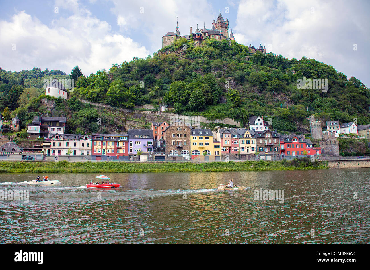 Amphibious vehicle driving on Moselle river, passing the imperial castle, Cochem, Rhineland-Palatinate, Germany Stock Photo