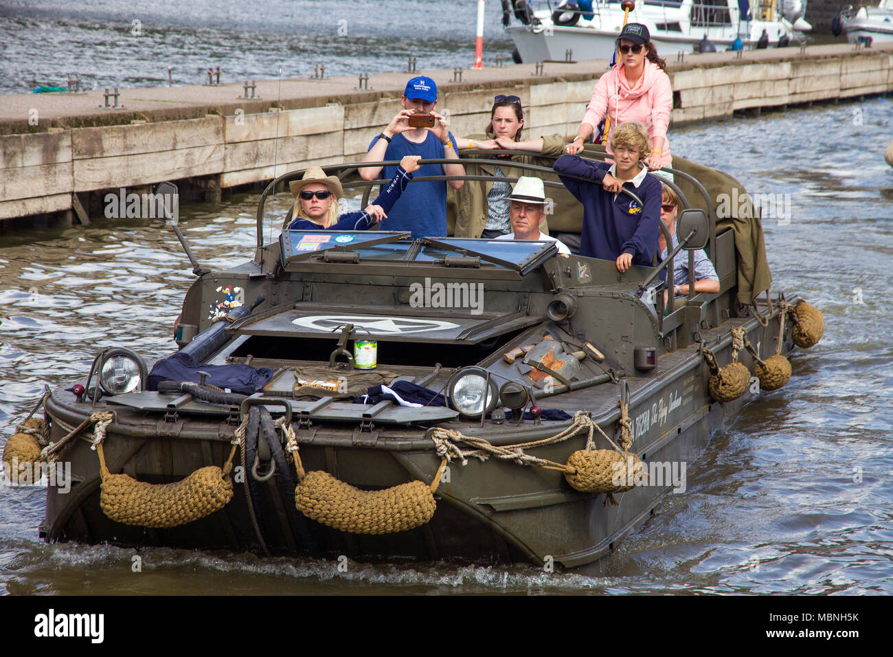 Military amphibious vehicle driving out of water at Moselle river, Cochem, Rhineland-Palatinate, Germany Stock Photo