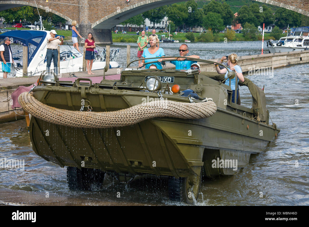 Military amphibious vehicle driving out of water at Moselle river, Cochem, Rhineland-Palatinate, Germany Stock Photo