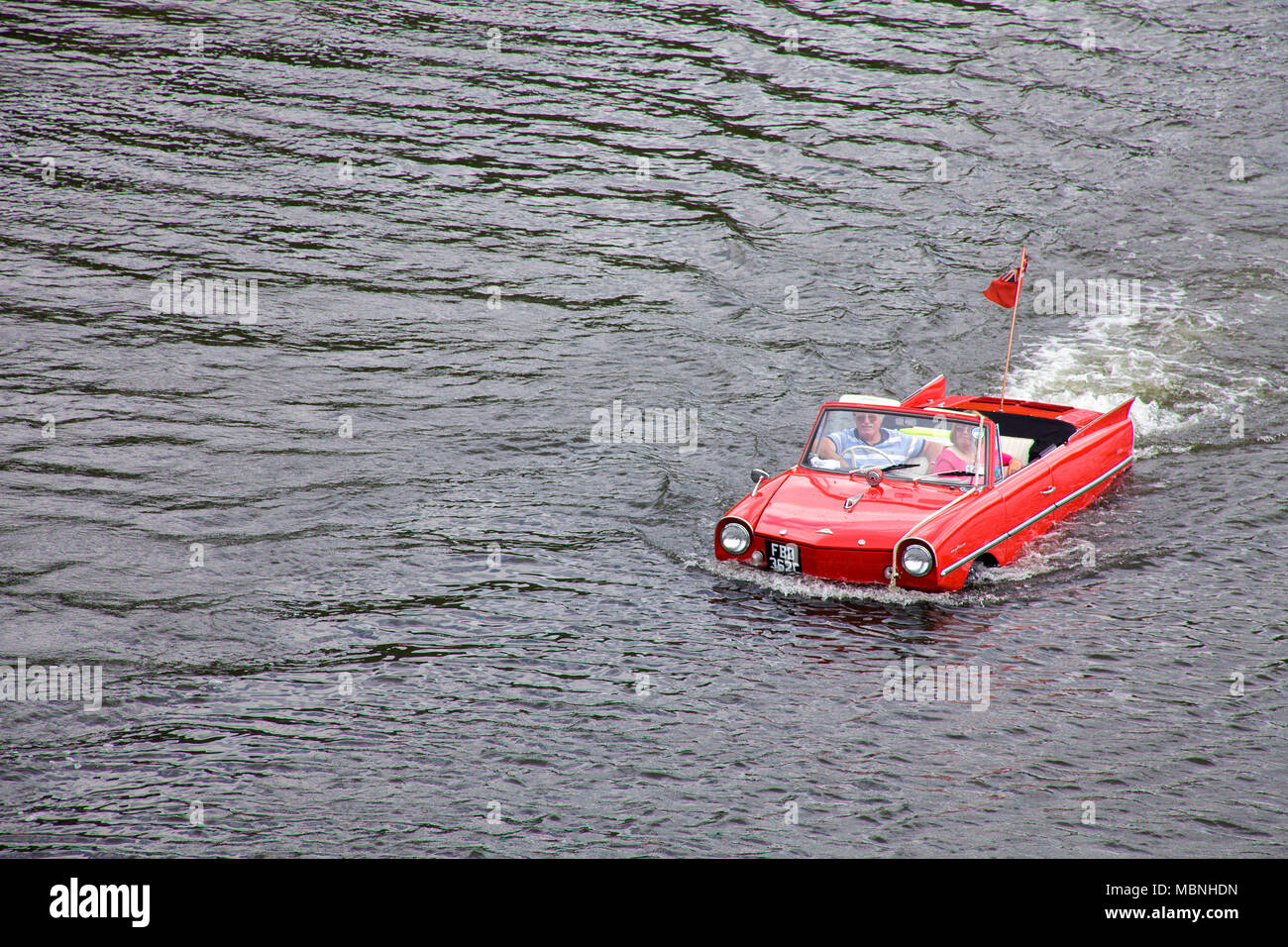 Amphic car, a german amphibious vehicle driving on Moselle river at Piesport, Rhineland-Palatinate, Germany Stock Photo