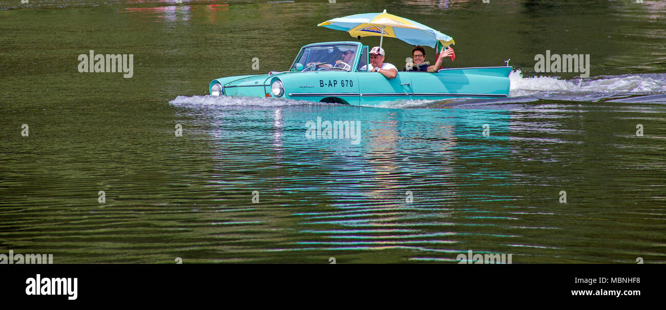 Amphic car, a german amphibious vehicle driving on Moselle river at Piesport, Rhineland-Palatinate, Germany Stock Photo