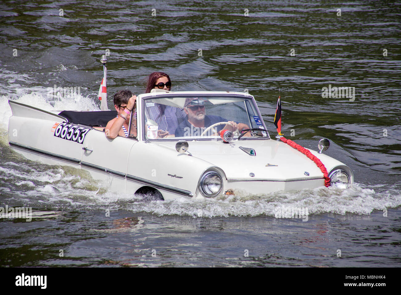 Amphic car, a german amphibious vehicle driving on Moselle river at Neumagen-Dhron, Rhineland-Palatinate, Germany Stock Photo