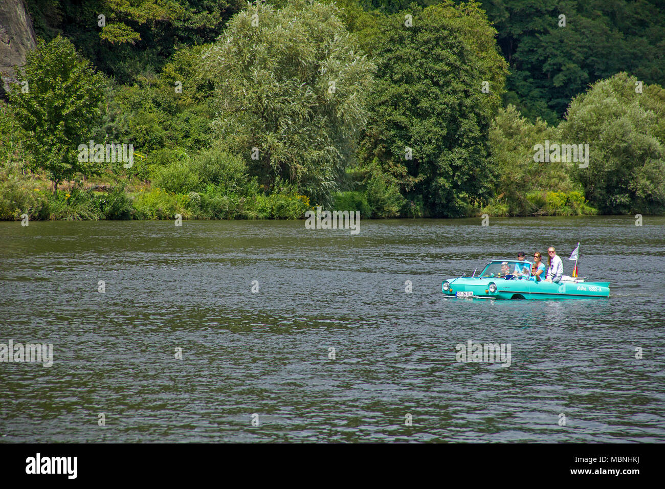 Amphic car, a german amphibious vehicle driving on Moselle river at Neumagen-Dhron, Rhineland-Palatinate, Germany Stock Photo