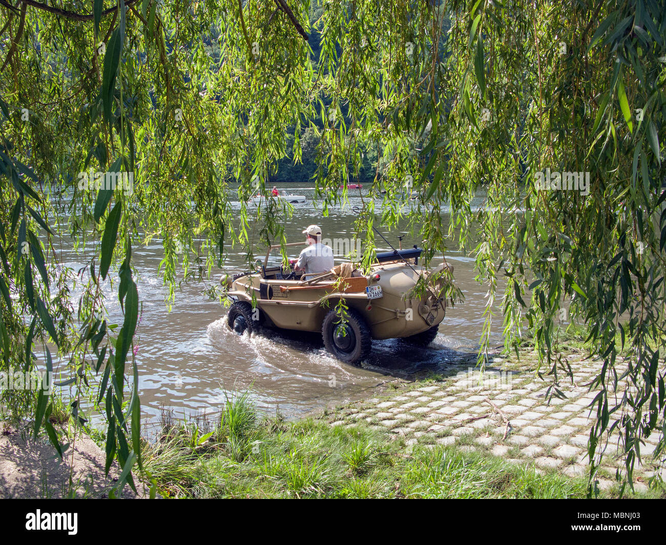 VW Typ 166, a german amphibious vehicle built at the 2nd world war driving on Moselle river, Minheim, Rhineland-Palatinate, Germany Stock Photo