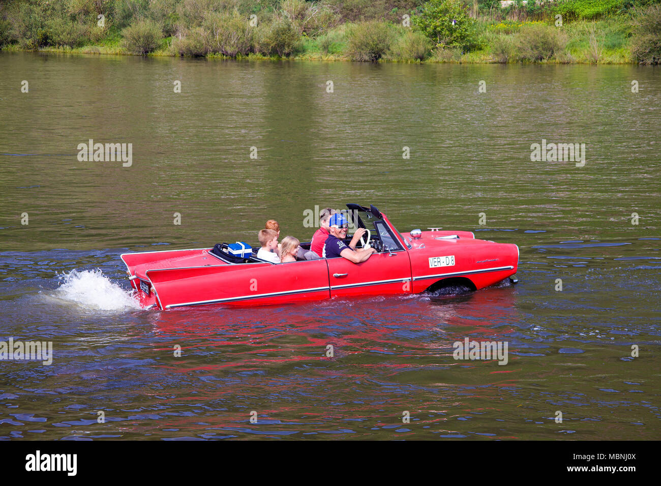 Amphic car, a german amphibious vehicle driving on Moselle river at Cochem, Rhineland-Palatinate, Germany Stock Photo