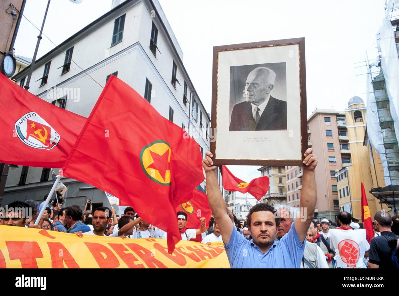 protest against the international G8 summit in Genoa (Italy), July 2001, Kurdish flag and portrait of Pertini President of the Republic Stock Photo
