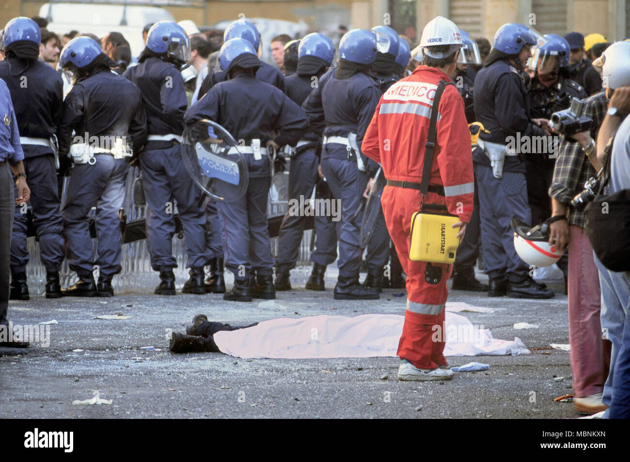 protest against the international G8 summit in Genoa (Italy), July 2001, the body of Carlo Giuliani, a young man killed by a pistol shot by a policeman during riots Stock Photo