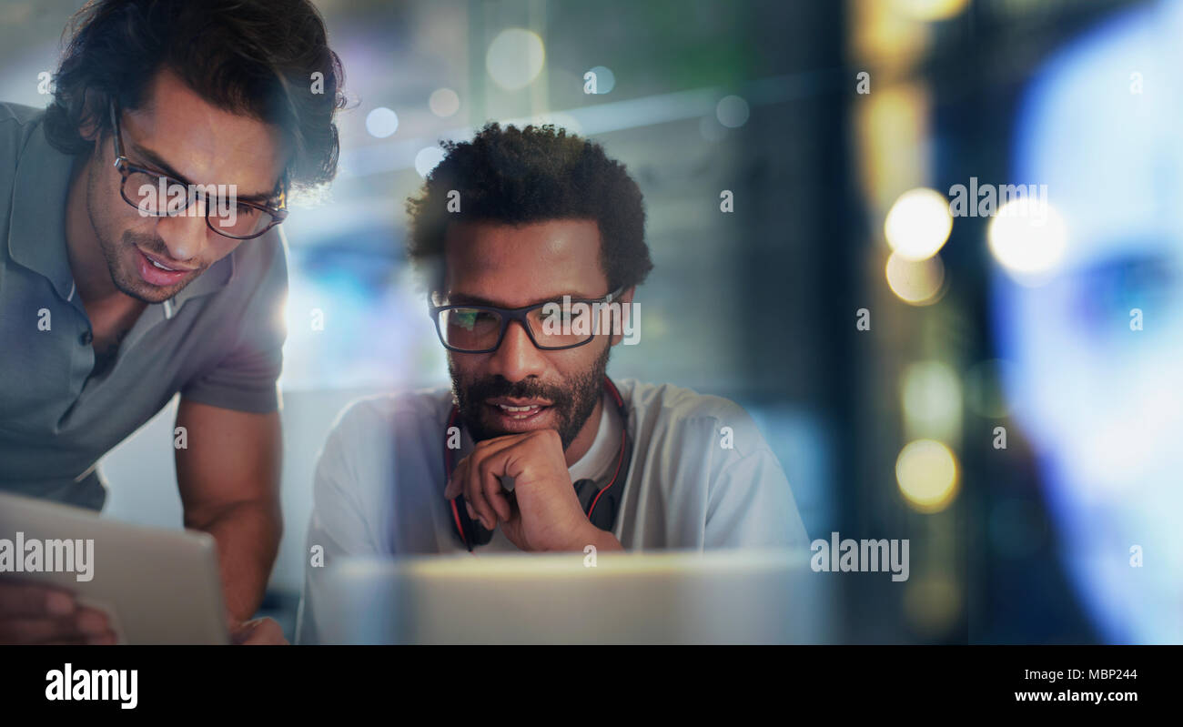 Businessmen using digital tablet and laptop Stock Photo