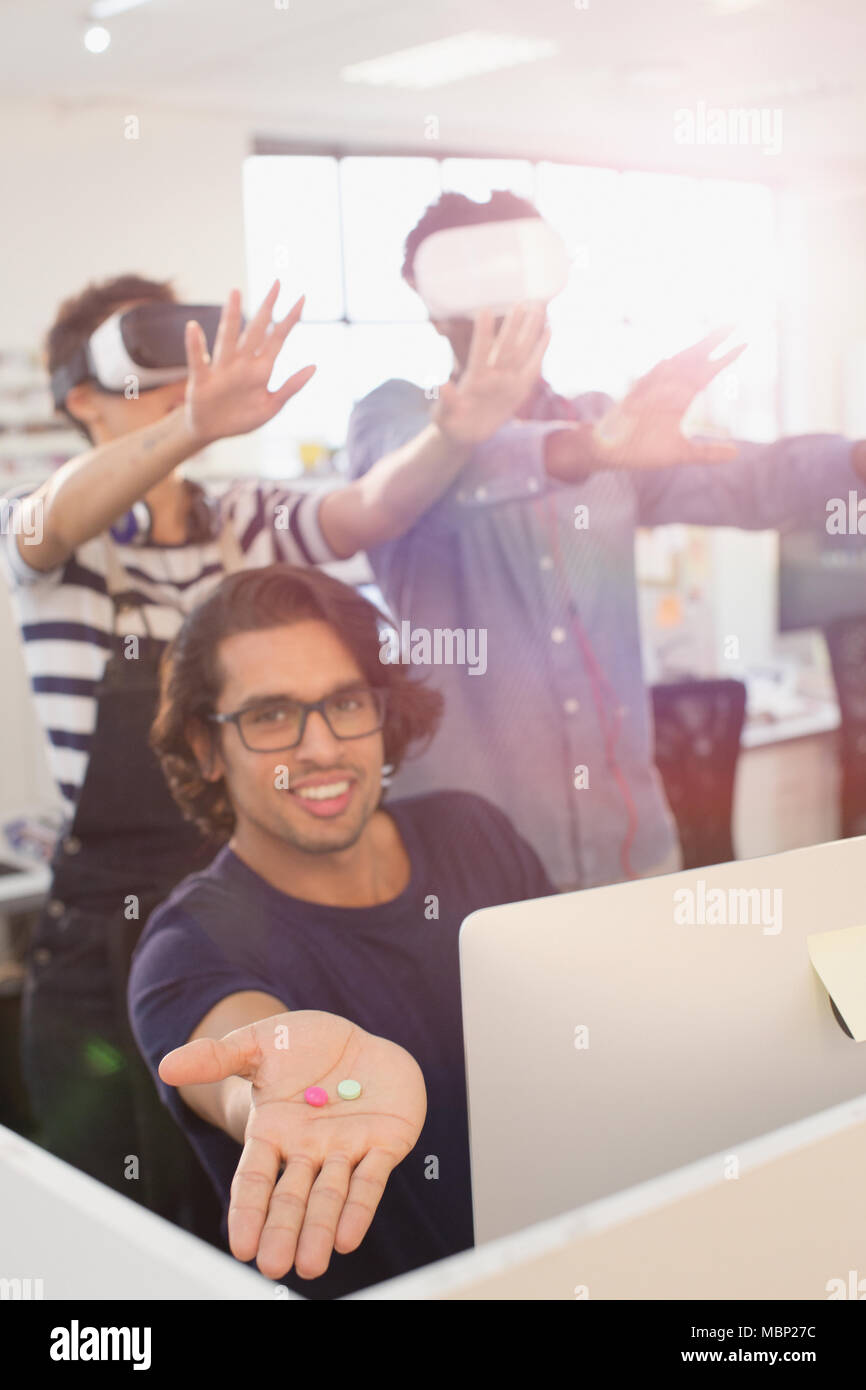 Portrait computer programmers testing virtual reality simulators Stock Photo