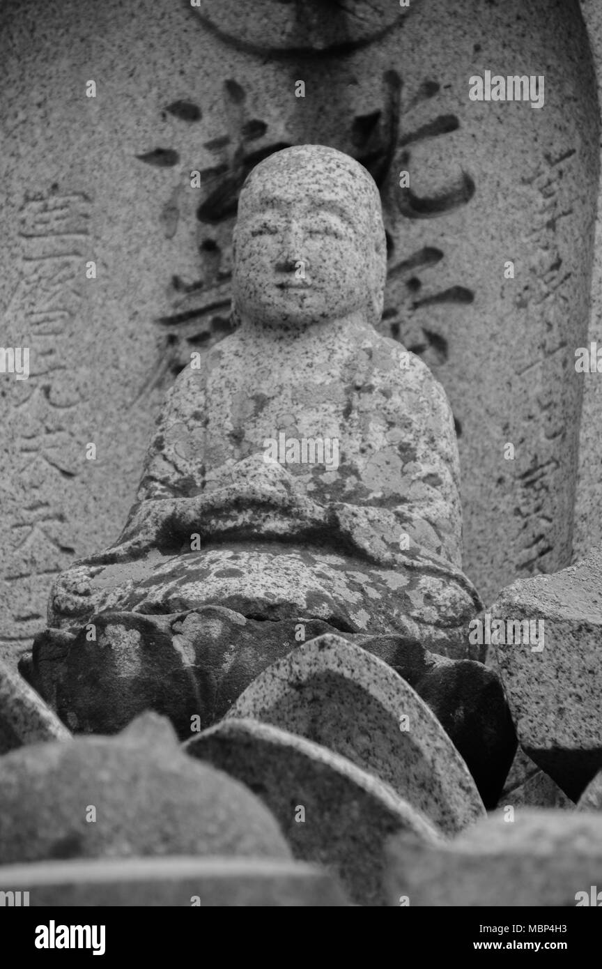 Black And White Photo Of Buddha Statue On A Grave Stock Photo Alamy