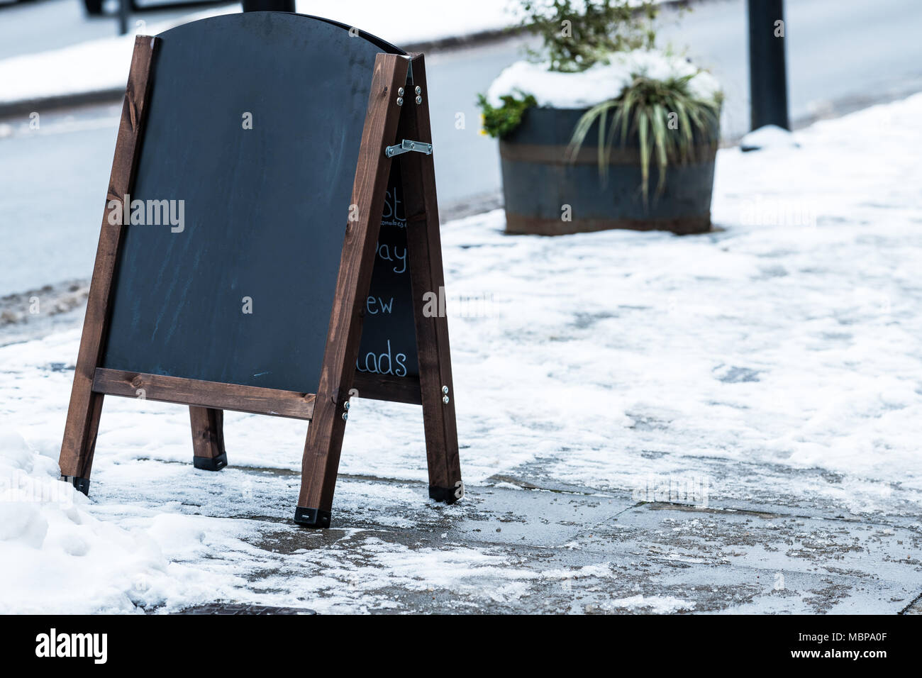 Empty board advertising stand on the path Stock Photo