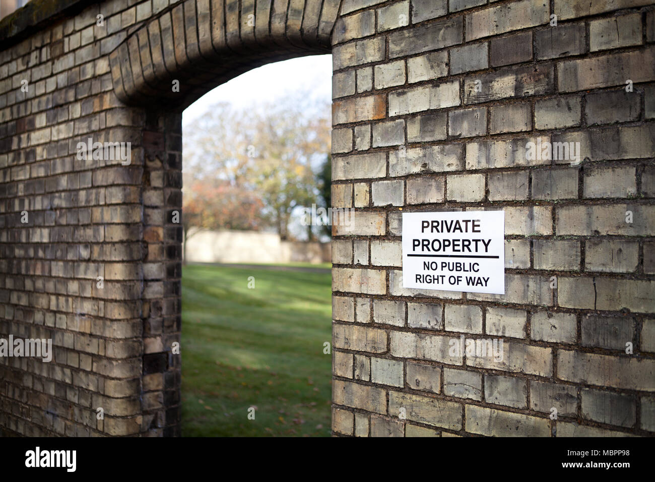 'Private property': An entrance to the walled garden at the eastern end of Fairfield Hall, originally the Three Counties Asylum, now luxury apartments Stock Photo