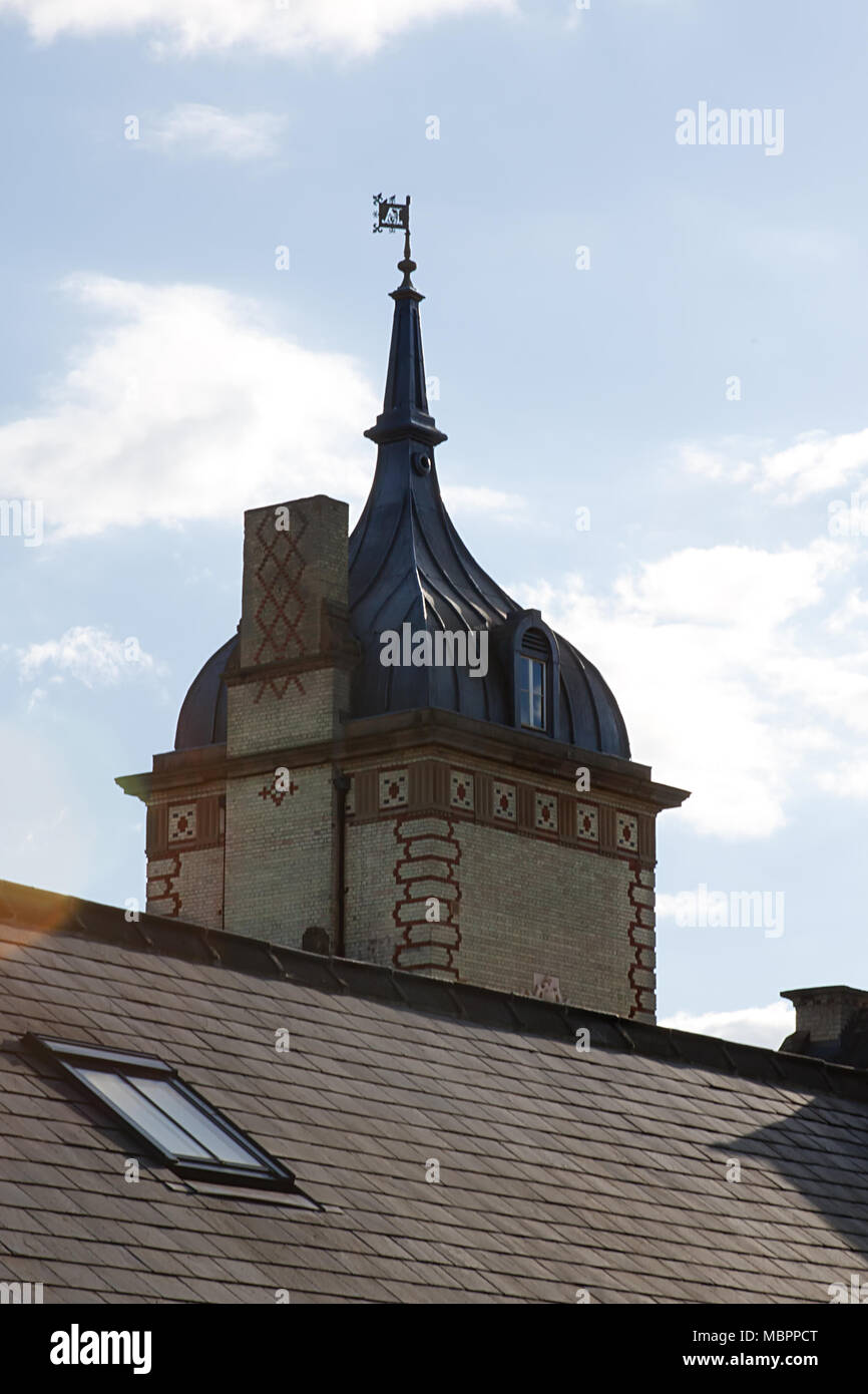 The gothic towers of Fairfield Hall in Bedfordshire, originally a Victorian asylum, now luxury apartments. Stock Photo