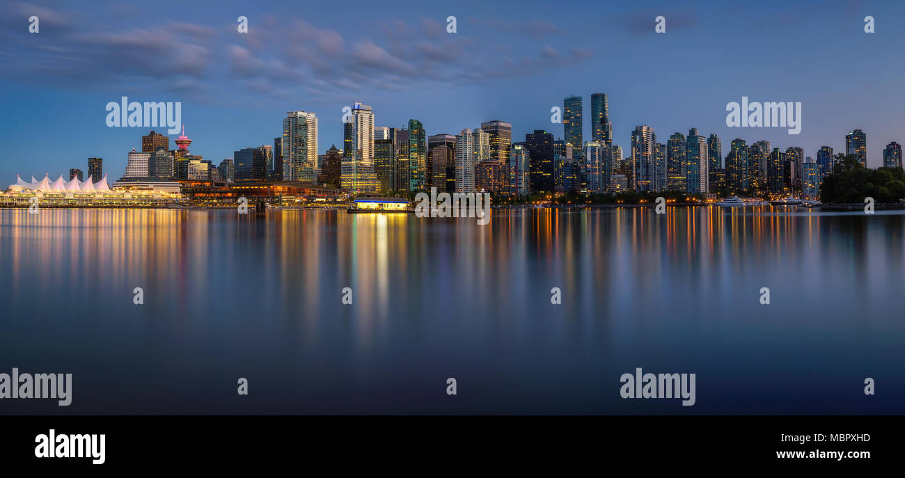 Night skyline of Vancouver downtown from Stanley Park Stock Photo