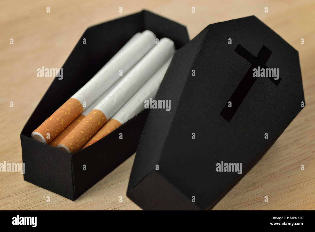 Cigarettes in a black coffin - Stop smoking concept Stock Photo