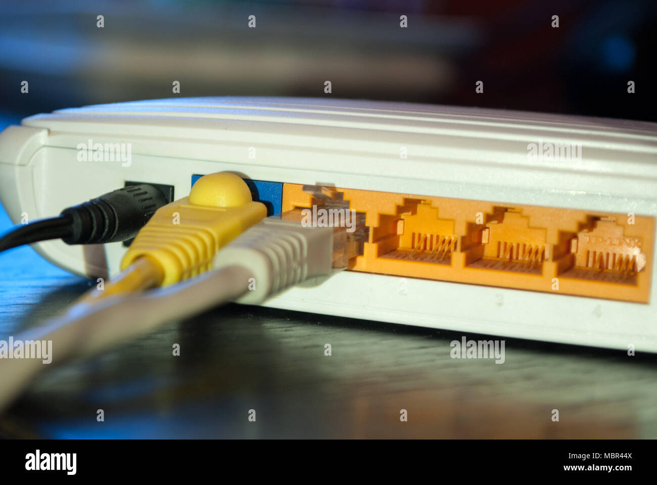 Network internet cable plugs in Wifi router. Close up, selective focus.  Internet concept Stock Photo - Alamy