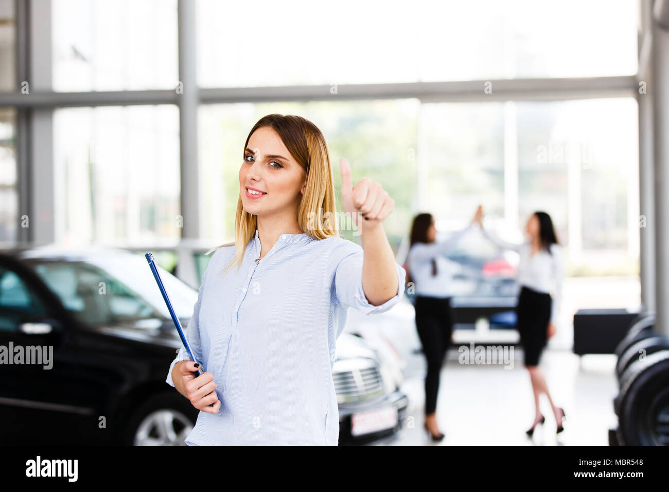 Blonde Woman Standing Thumbs Up High Resolution Stock Photography and ...