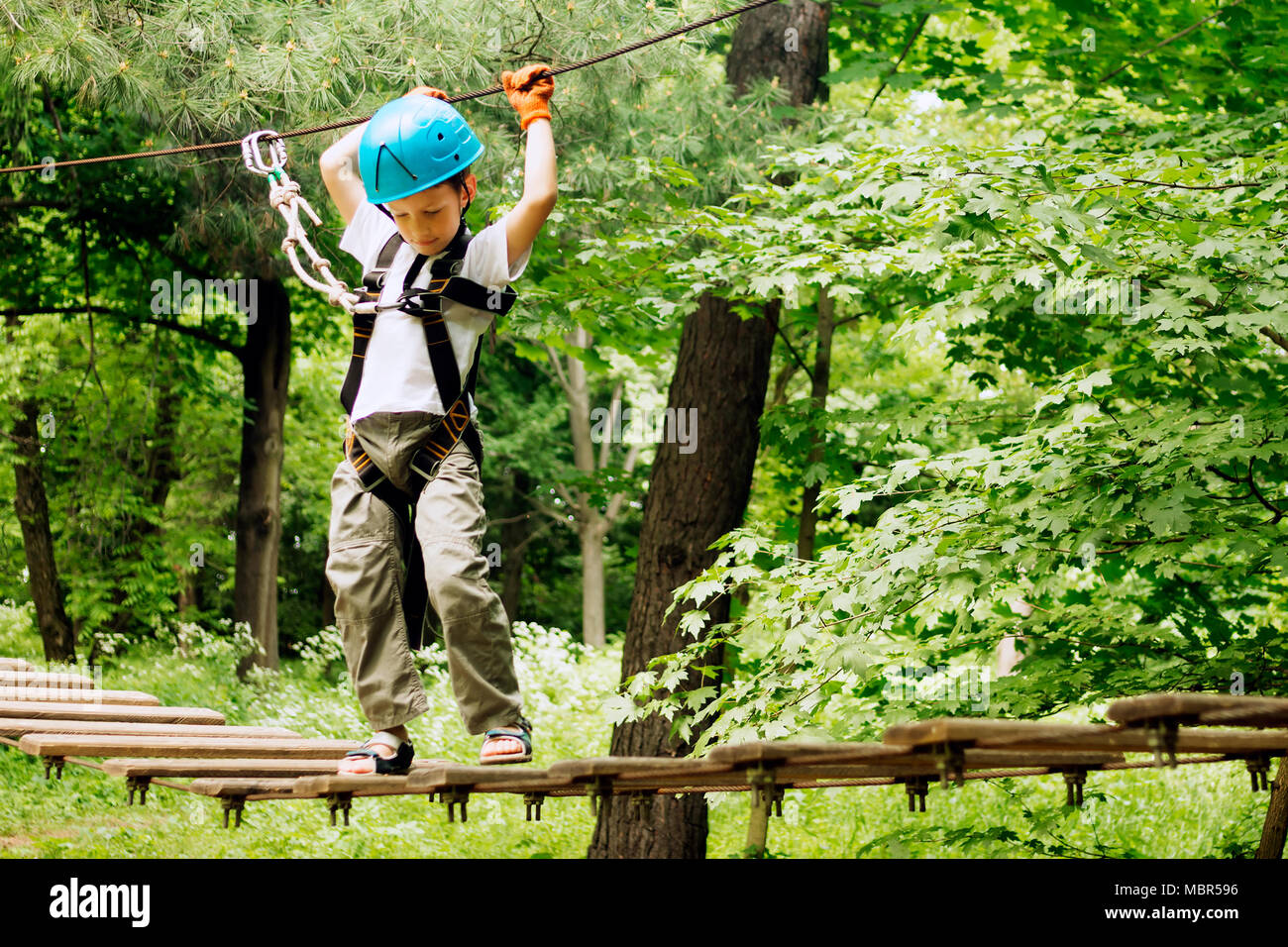 Boy Using A Rope Five year boy on rope hi-res stock photography and images - Alamy