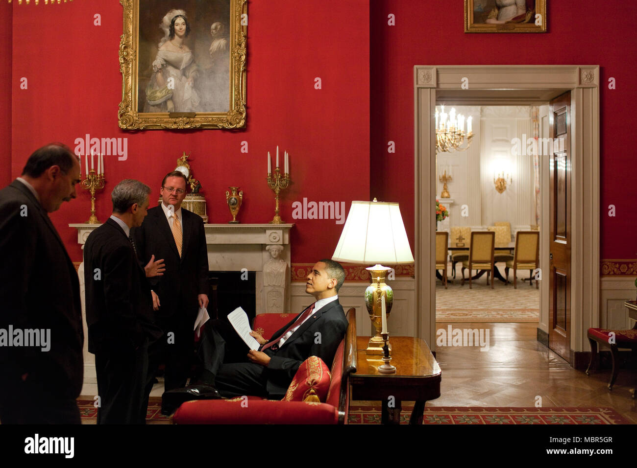 President Barack Obama with  Senior Advisor David Axelrod, Chief of Staff Rahm Emanuel and Press Secretary Robert Gibbs in the Red Room prior to Live Prime Time Press Conference in East Room 3/24/09. .Official White House Photo by Pete Souza Stock Photo
