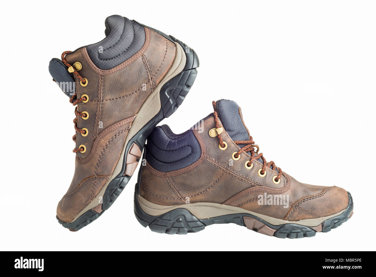 Pair of new hiking boots isolated on white background Stock Photo - Alamy