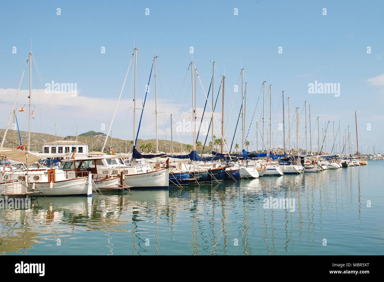 Sailing boats moored in the marina at Puerto Pollensa on the Spanish island of Majorca on September 4, 2017. Stock Photo