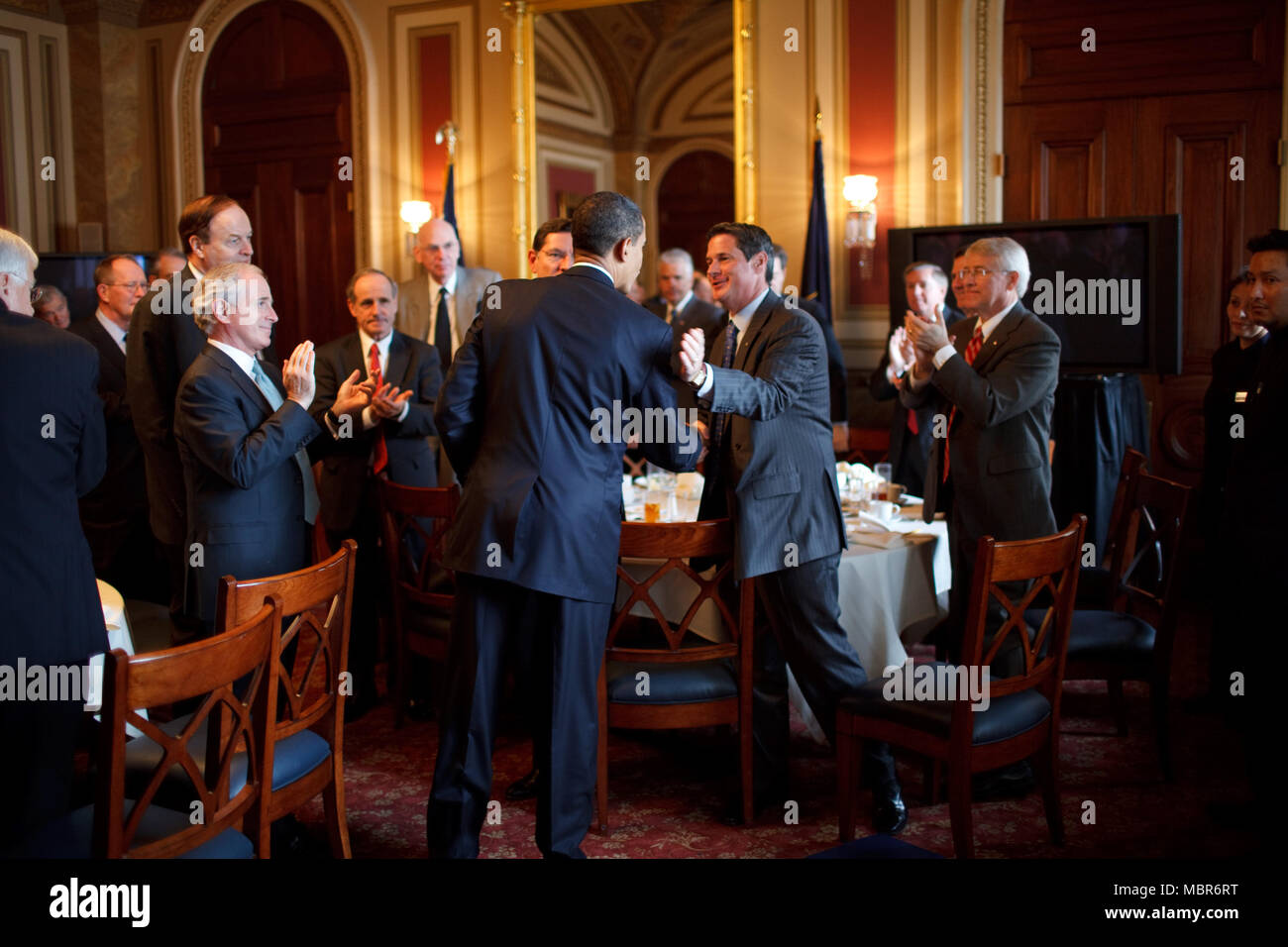 President Barack Obama attends a lunch with Senate Republicans on Capitol Hill, Washington D.C. 1/27/09. Official White House Photo by Pete Souza Stock Photo