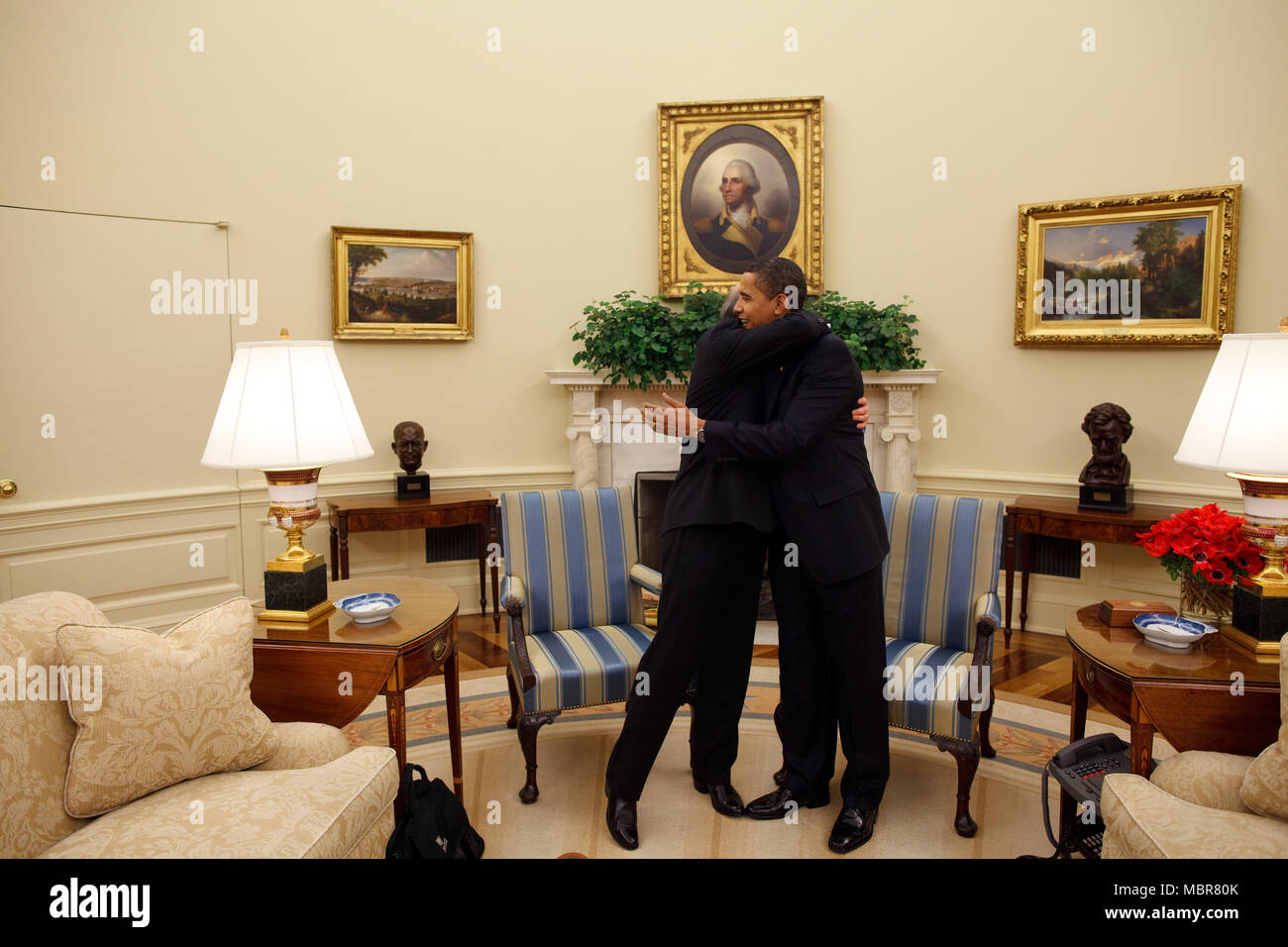 President Barack Obama Hugs Interior Secretary Ken Salazar