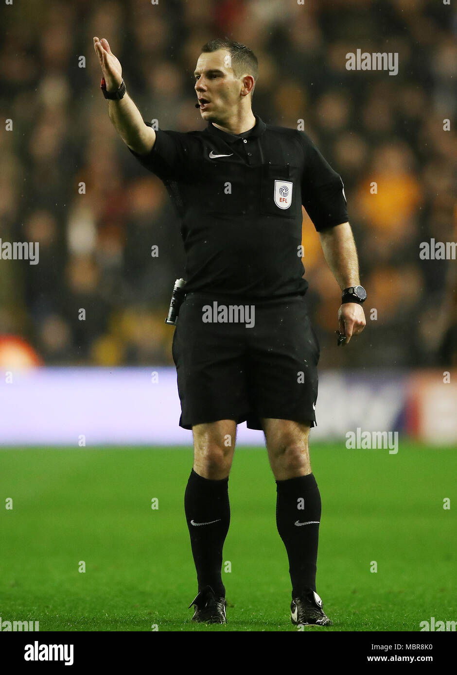 Referee Tim Robinson during the Sky Bet Championship match at Molineux, Wolverhampton. PRESS ASSOCIATION Photo. Picture date: Wednesday April 11, 2018. See PA story SOCCER Wolves. Photo credit should read: Nick Potts/PA Wire. RESTRICTIONS: No use with unauthorised audio, video, data, fixture lists, club/league logos or 'live' services. Online in-match use limited to 75 images, no video emulation. No use in betting, games or single club/league/player publications. Stock Photo