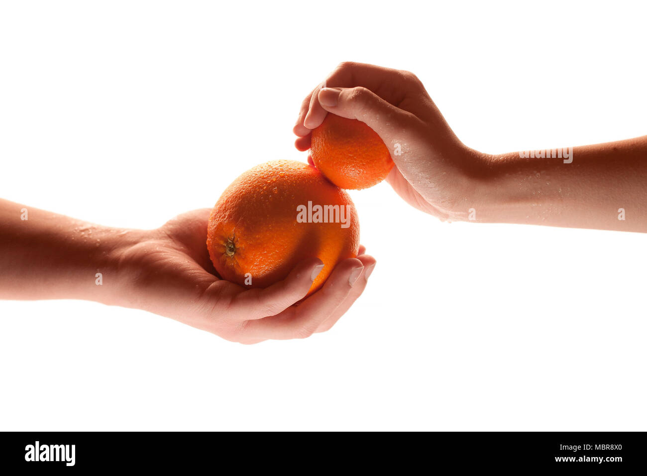 Touching hands - warm mood Stock Photo