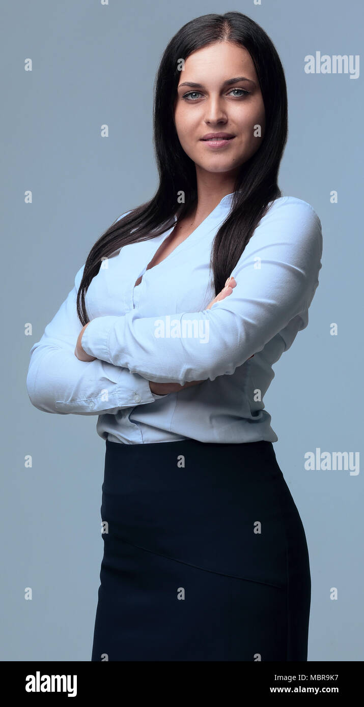beautiful woman standing with her arms crossed Stock Photo - Alamy