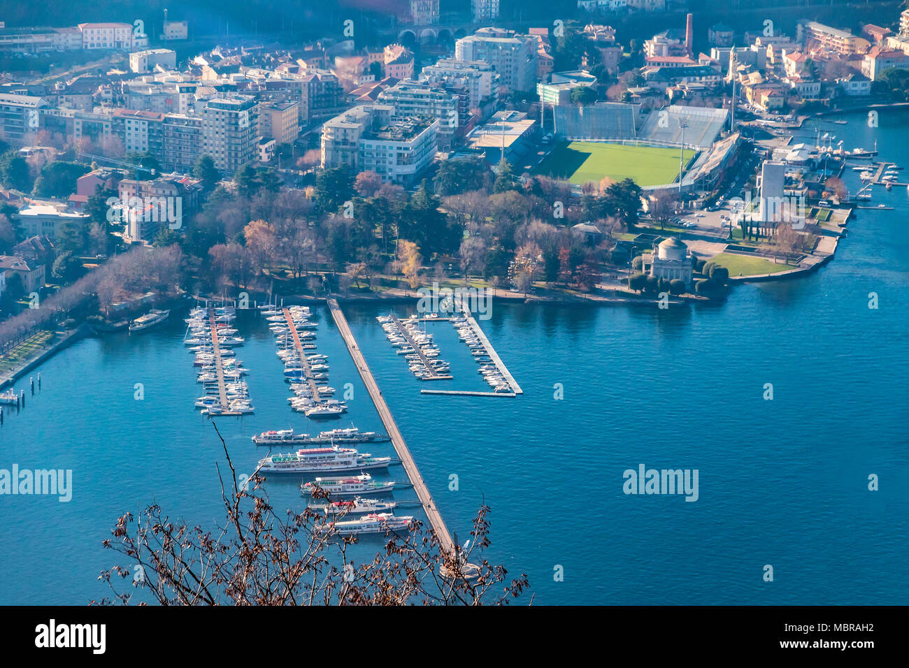 Aerial landscape of the picturesque colorful City of Como on Lake Como, Italy. Port of Como on a foreground. European vacation, living life style, tra Stock Photo