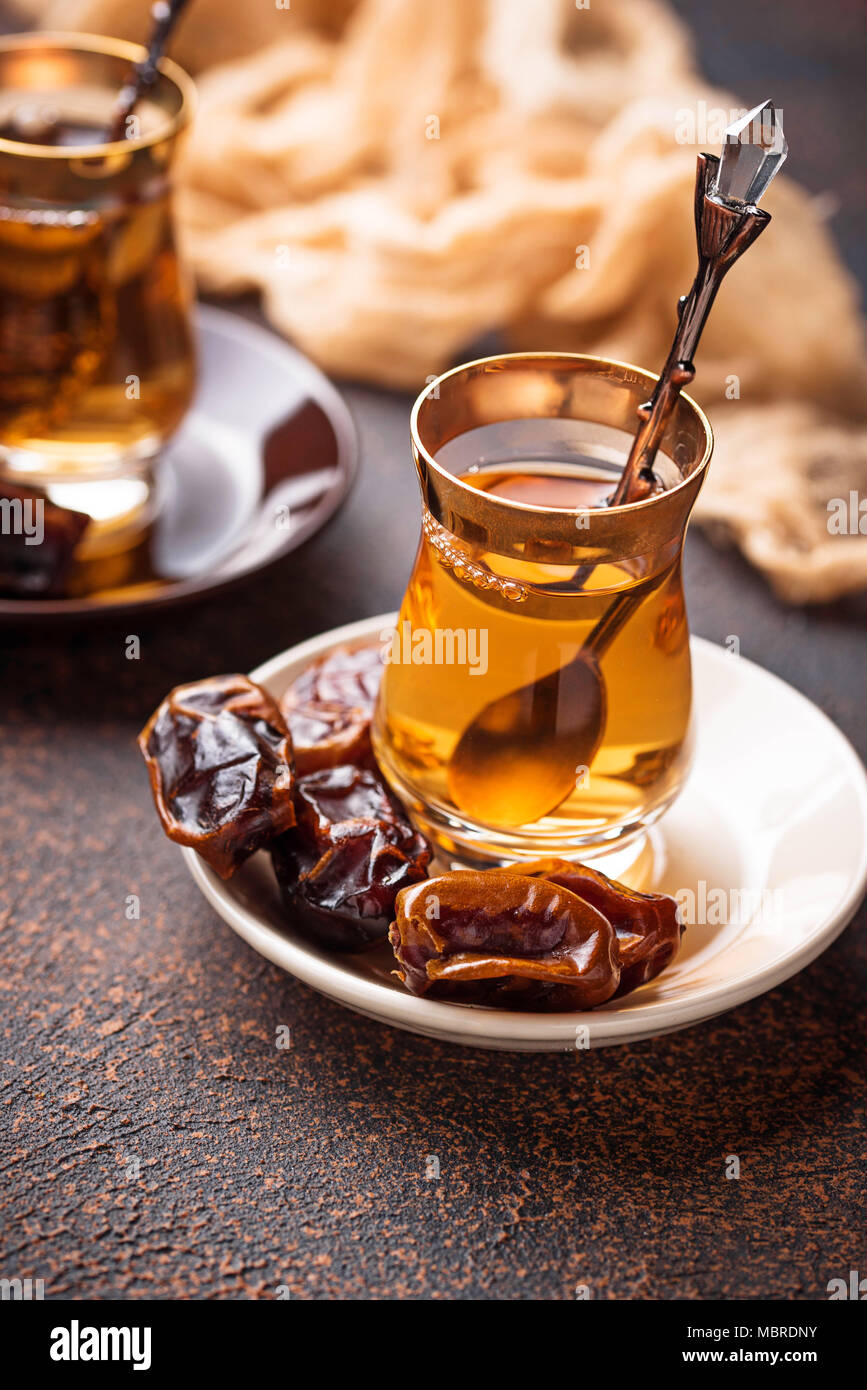 Traditional arabic tea and dry dates Stock Photo Alamy