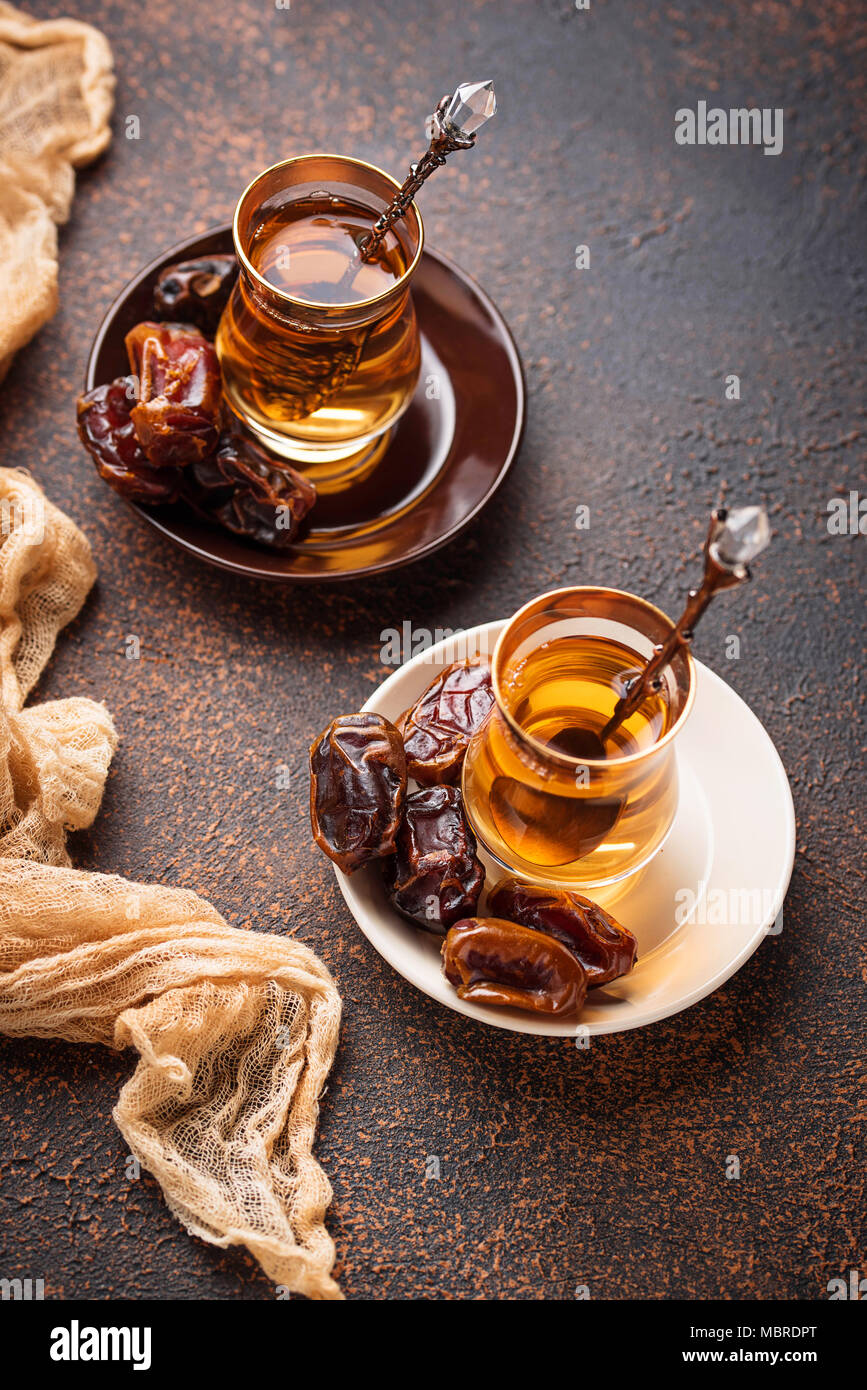 Traditional arabic tea and dry dates Stock Photo Alamy