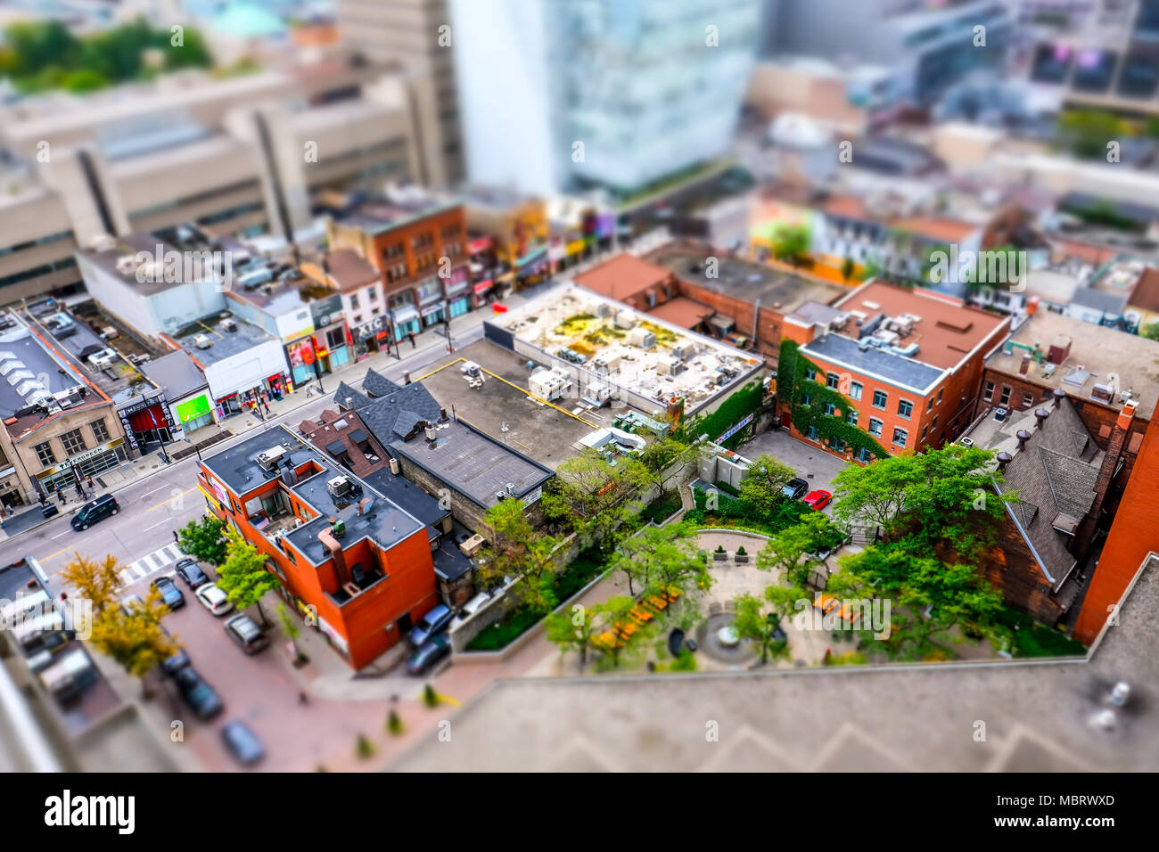 Interesting, diorama effect giving miniature details to the Toronto city centre, showing streets and the modern University building in the background. Stock Photo